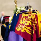 Queen Elizabeth II 's grandchildren Britain's Prince William, Prince of Wales (left) and Britain's Prince Harry, Duke of Sussex (right) hold a vigil at the coffin of their 'grannie'. Picture: Aaron Chown/AFP via Getty Images