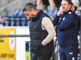 Lee Johnson looks crestfallen during Hibs' 1-0 defeat by Falkirk in the Premier Sports Cup.