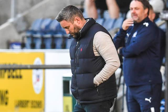 Lee Johnson looks crestfallen during Hibs' 1-0 defeat by Falkirk in the Premier Sports Cup.