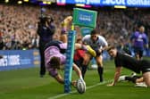 An airborne Darcy Graham scores what looks like a spectacular try against New Zealand only for it to be overturned for a foot in touch. (Photo by Ross MacDonald / SNS Group)