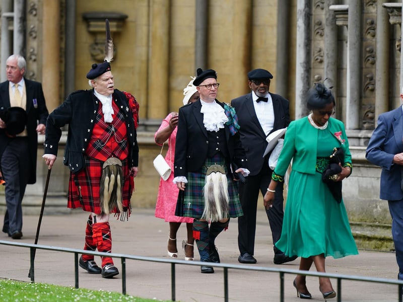 Guests arriving ahead of the coronation ceremony of King Charles III and Queen Camilla at Westminster Abbey, London.