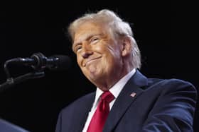 A triumphant Donald Trump addresses the crowd during the election night party at the Palm Beach County Convention Center in Florida (Picture: Jabin Botsford/The Washington Post via Getty Images)