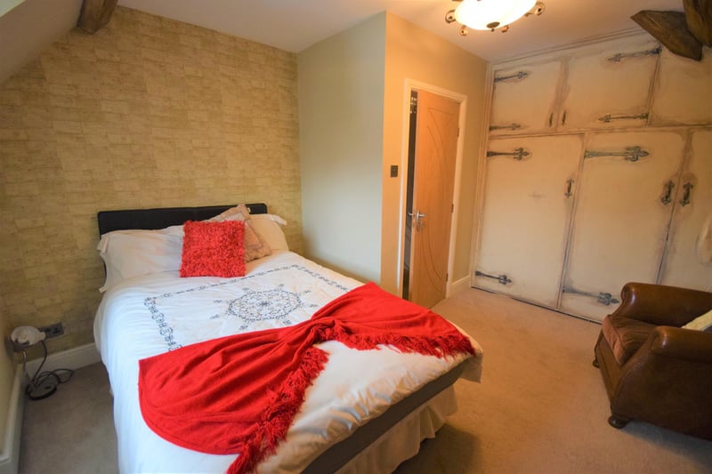 This fourth double bedroom has been stylishly decorated and includes matching built-in storage cupboards, radiator, socket points and double glazed window.