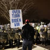 National Guard and the Washington DC police eventually regained control of the area around the US Capitol after thousands of Donald Trump's supporters stormed the building (Picture: Spencer Platt/Getty Images)