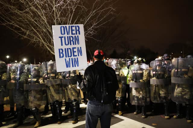 National Guard and the Washington DC police eventually regained control of the area around the US Capitol after thousands of Donald Trump's supporters stormed the building (Picture: Spencer Platt/Getty Images)