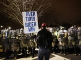 National Guard and the Washington DC police eventually regained control of the area around the US Capitol after thousands of Donald Trump's supporters stormed the building (Picture: Spencer Platt/Getty Images)