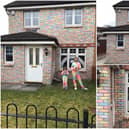 Scottish girls cover front of house in colourful chalk to add some cheer