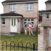 Scottish girls cover front of house in colourful chalk to add some cheer