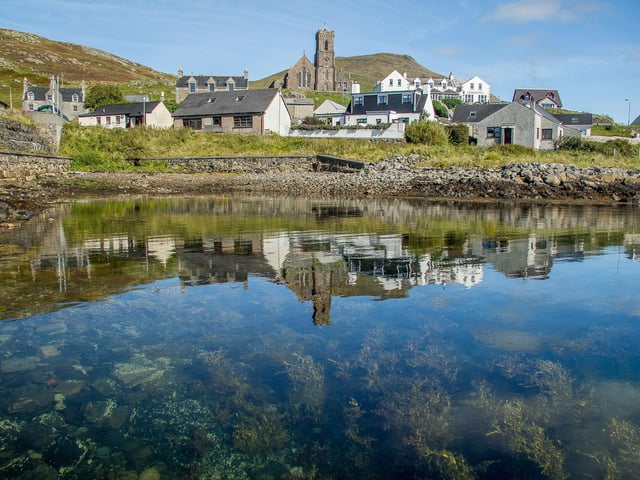 Jan Macneil says that the Outer Hebrides island, connected to adjacent island Vatersay by a causeway, is "the most beautiful place ever".