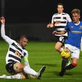 Rangers' Ross McCausland (right) competes with Sean McGinty during the SPFL Trust Trophy match between Rangers B and Ayr United at the C&G Systems Stadium on September 14, 2021, in Dumbarton, Scotland.  (Photo by Craig Foy / SNS Group)