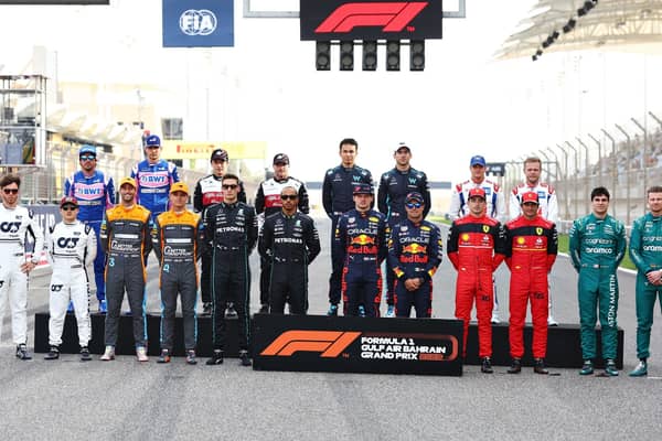 The F1 Class of 2022 drivers pose for a photo on track before the F1 Grand Prix of Bahrain at Bahrain International Circuit on March 20th. Photo: Lars Baron/Getty Images.