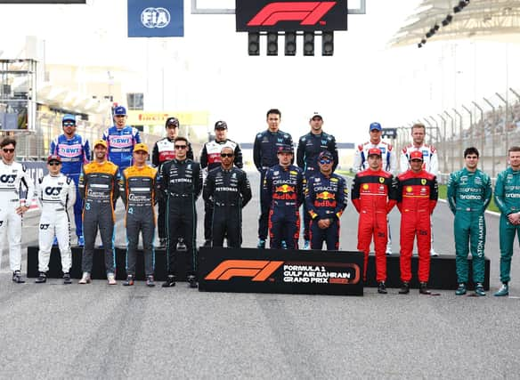 The F1 Class of 2022 drivers pose for a photo on track before the F1 Grand Prix of Bahrain at Bahrain International Circuit on March 20th. Photo: Lars Baron/Getty Images.