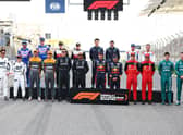 The F1 Class of 2022 drivers pose for a photo on track before the F1 Grand Prix of Bahrain at Bahrain International Circuit on March 20th. Photo: Lars Baron/Getty Images.