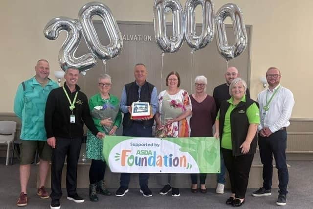 L-R: Craig Taylor, Children and Family Worker at Larkhall Baptist Church, Kevin McPhee, Lead Community GSM at Asda, Terry Paterson, Treasurer, The Church at the Cross, Danny McCabe, Senior Director, Asda West Scotland, Susan Taylor, Hareleeshill Community Hub Manager, Nancy Barr, Board Member, The Church at the Cross, Ali Scott, Pastor, Larkhall Baptist Church, Bernadette Hart, Asda Motherwell Community Champion and Chris Thomson, Asda Larkhall General Store Manager.