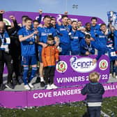 The Cove Rangers squad celebrate winning the league title.