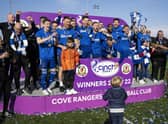 The Cove Rangers squad celebrate winning the league title.