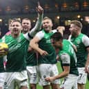 Hibs' Martin Boyle leads the celebrations at full time after his hat-trick helped down Rangers at Hampden in 2021.