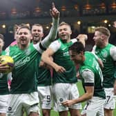 Hibs' Martin Boyle leads the celebrations at full time after his hat-trick helped down Rangers at Hampden in 2021.