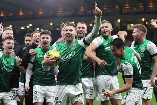 Hibs' Martin Boyle leads the celebrations at full time after his hat-trick helped down Rangers at Hampden in 2021.