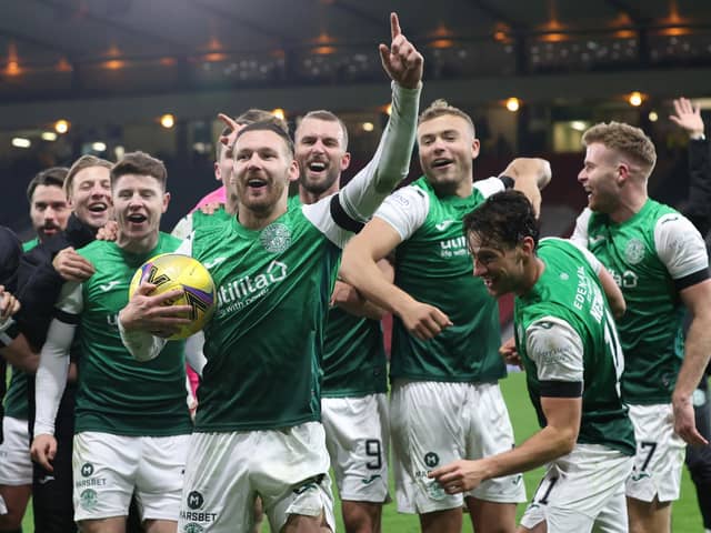 Hibs' Martin Boyle leads the celebrations at full time after his hat-trick helped down Rangers at Hampden in 2021.