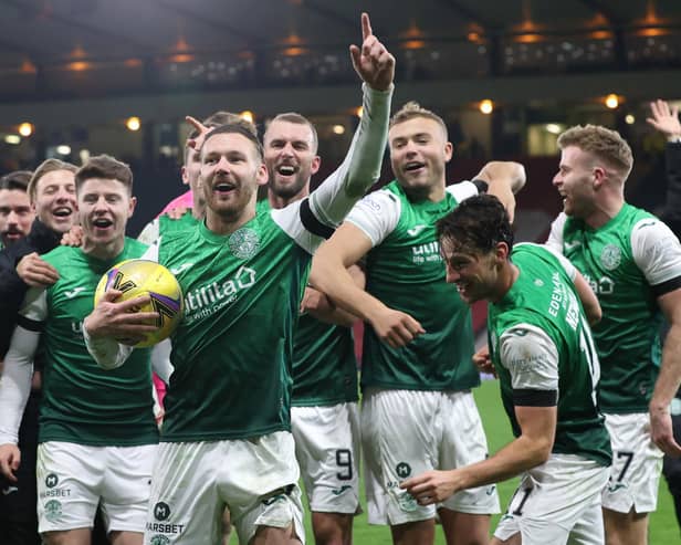 Hibs' Martin Boyle leads the celebrations at full time after his hat-trick helped down Rangers at Hampden in 2021.