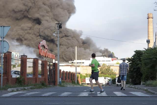 Smoke rises after a Russian missile strike on a warehouse of an industrial and trading company in Odesa (Picture: Oleksandr Gimanov/AFP via Getty Images)