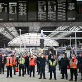 Railway staff and members of the public observe a minute’s silence at Glasgow's Queen Street Station a week after three people were killed when an Aberdeen to Glasgow train derailed on 12 August 2020, near Carmont, west of Stonehaven (Picture: Jeff J Mitchell/Getty Images)