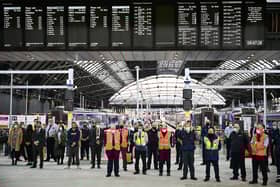 Railway staff and members of the public observe a minute’s silence at Glasgow's Queen Street Station a week after three people were killed when an Aberdeen to Glasgow train derailed on 12 August 2020, near Carmont, west of Stonehaven (Picture: Jeff J Mitchell/Getty Images)
