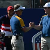 Bob MacIntyre is greeted by Europe's captain Luke Donald on the first tee ahead of his singles win over US Open champion Wyndham Clark. Picture: Andreas Solaro/AFP via Getty Images.