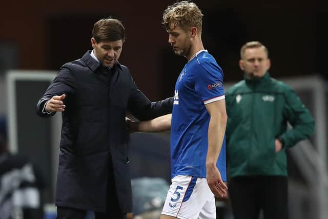 Rangers manager Steven Gerrard talks with Filip Helander during the UEFA Europa League Round of 32 match between Rangers FC and Royal Antwerp FC at  on February 25, 2021 in Glasgow, Scotland.  (Photo by Ian MacNicol/Getty Images)