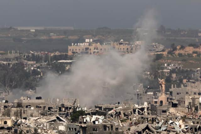 Smoke billows amid destroyed buildings in Gaza in this picture taken from a position in southern Israel this week.