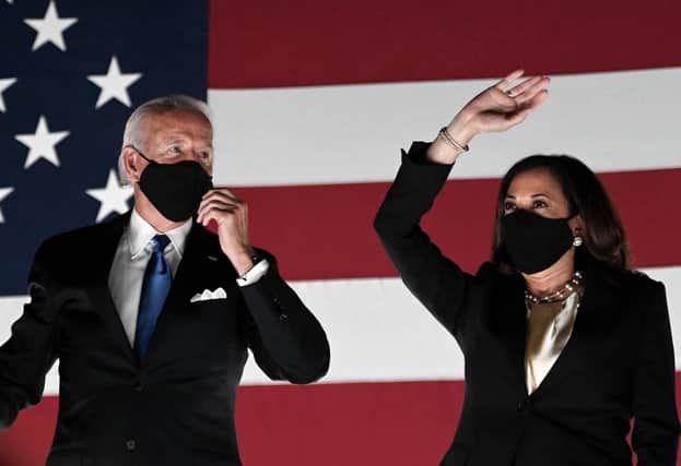 Joe Biden, seen with Vice-President Kamala Harris, has promised the US power sector will produce net-zero carbon emissions by 2035 (Picture: Olivier Douliery/AFP via Getty Images)