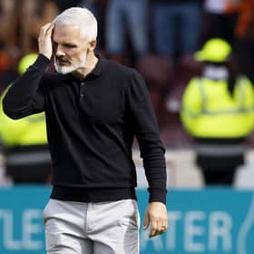 Dundee United manager Jim Goodwin is dejected as relegation is confirmed with defeat at Motherwell.  (Photo by Alan Harvey / SNS Group)