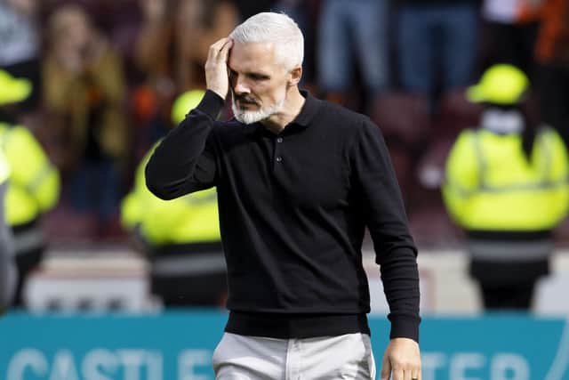 Dundee United manager Jim Goodwin is dejected as relegation is confirmed with defeat at Motherwell. (Photo by Alan Harvey / SNS Group)