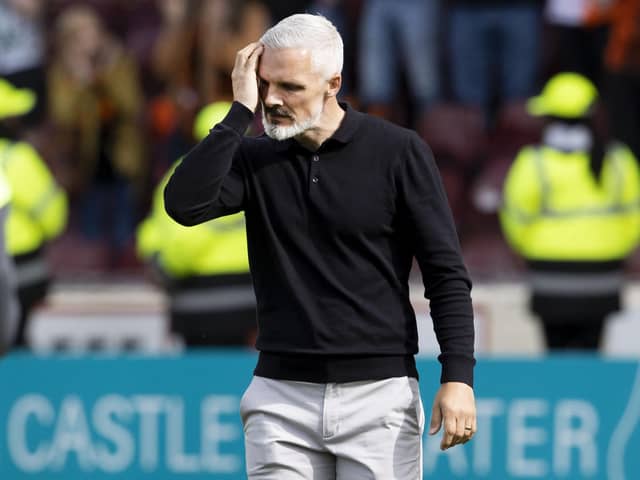 Dundee United manager Jim Goodwin is dejected as relegation is confirmed with defeat at Motherwell.  (Photo by Alan Harvey / SNS Group)