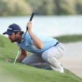 Scott Jamieson lines up a putt on the 18th hole in the third round of the Abu Dhabi HSBC Championship at Yas Links. Picture: Warren Little/Getty Images.