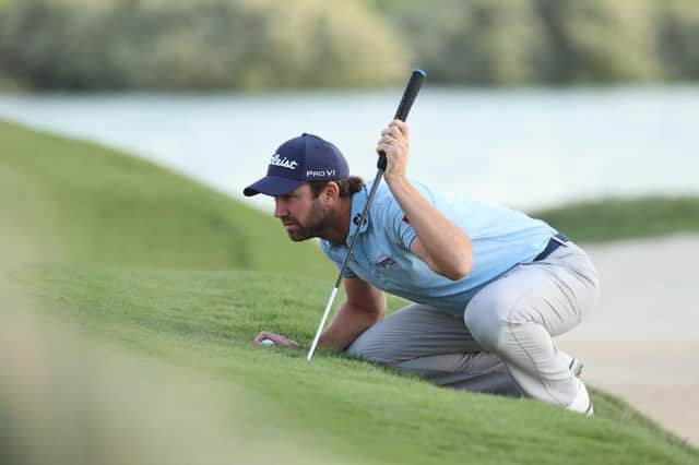 Scott Jamieson lines up a putt on the 18th hole in the third round of the Abu Dhabi HSBC Championship at Yas Links. Picture: Warren Little/Getty Images.