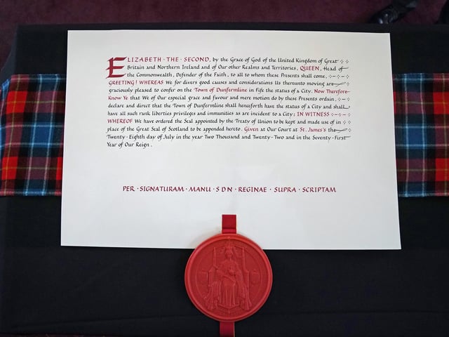 The letters patent confirming Dunfermline formally awarded city status as King Charles III and the Queen Consort attend an official council meeting at the City Chambers in Dunfermline, Fife, to formally mark the conferral of city status on the former town, ahead of a visit to Dunfermline Abbey to mark its 950th anniversary.