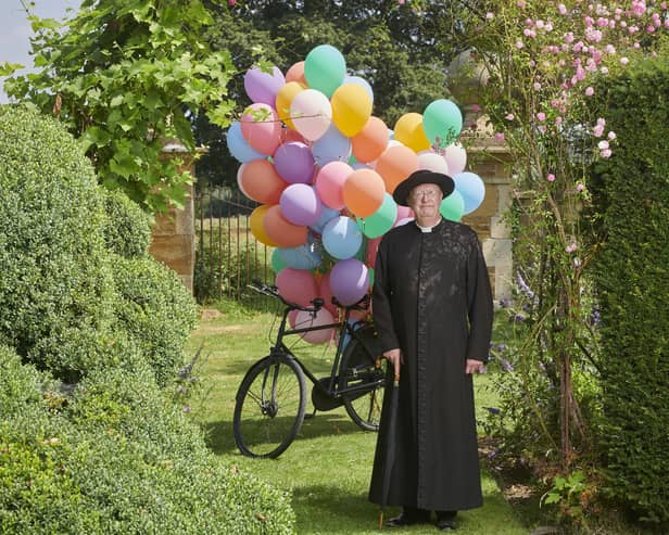 Father Brown, played by Mark Williams, with biodegradable balloons for the 100th Episode of the hit drama.