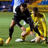 Celtic striker Albian Ajeti goes down under the attentions of Killie goalkeeper Colin Doyle. Picture: SNS