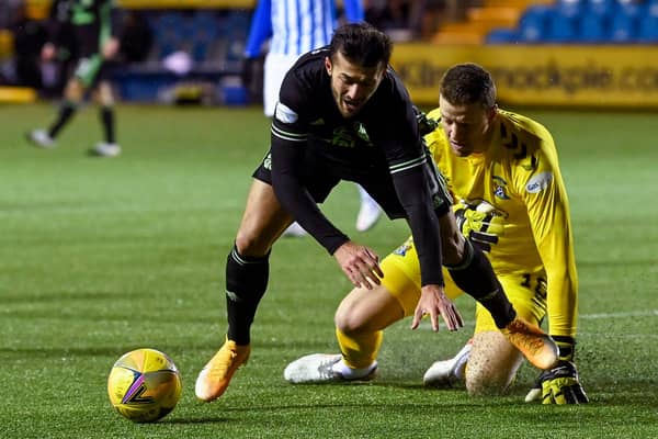 Celtic striker Albian Ajeti goes down under the attentions of Killie goalkeeper Colin Doyle. Picture: SNS