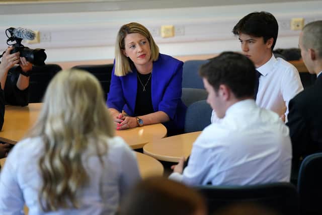 Education Secretary Jenny Gilruth chats to pupils during a visit to Craigmount High School in Edinburgh to mark SQA Results Day 2023. Andrew Milligan/PA Wire