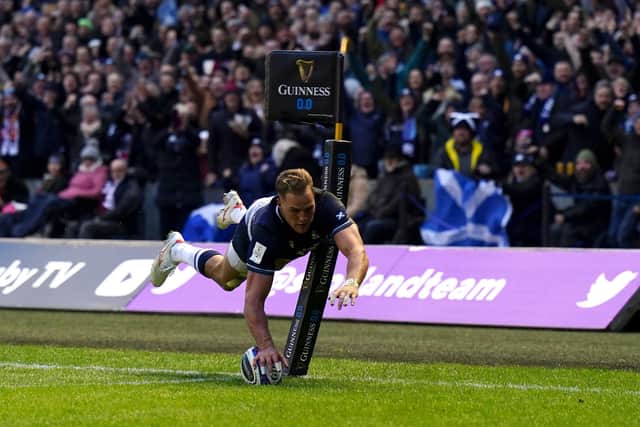 Duhan van der Merwe scores his second try of the match during Scotland's clash with England at Murrayfield.