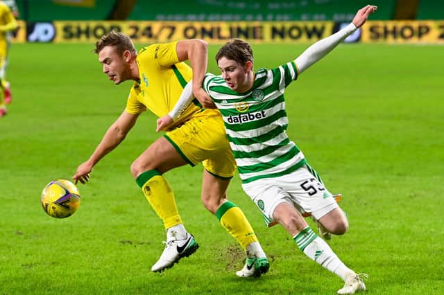 Cameron Harper battles for the ball with Hibs defender Ryan Porteous during the American's only first-team appearance for Celtic