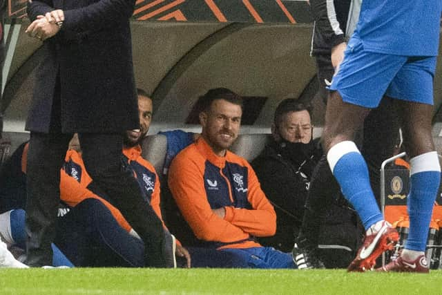 Aaron Ramsey watches on from the Rangers bench during the first leg defeat to Braga. (Photo by Craig Foy / SNS Group)