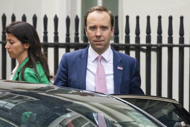 UK Health Secretary Matt Hancock leaves 10 Downing Street with aide Gina Coladangelo. Picture: Dan Kitwood/Getty Images