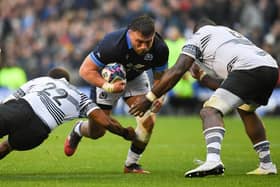 Scotland's Rory Sutherland breaks through against Fiji.   (Photo by Ross MacDonald / SNS Group)