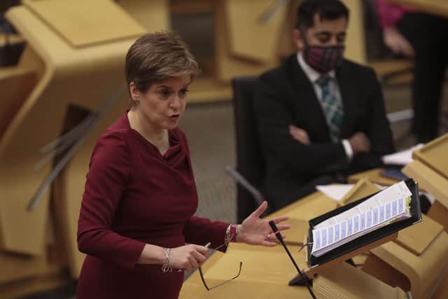 Scotland's First Minister Nicola Sturgeon, during First Minster's Questions at the Scottish Parliament in Holyrood, Edinburgh. Picture date: Thursday December 23, 2021.