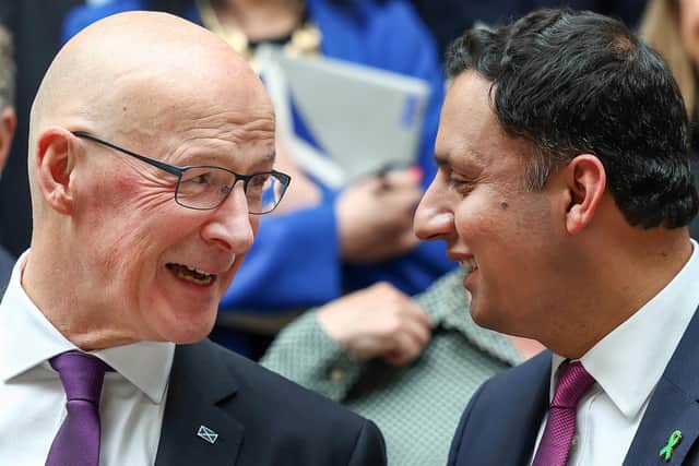 First Minister John Swinney and Scottish Labour leader Anas Sarwar attend a Mental Health awareness week photocall (Photo by Jeff J Mitchell/Getty Images)