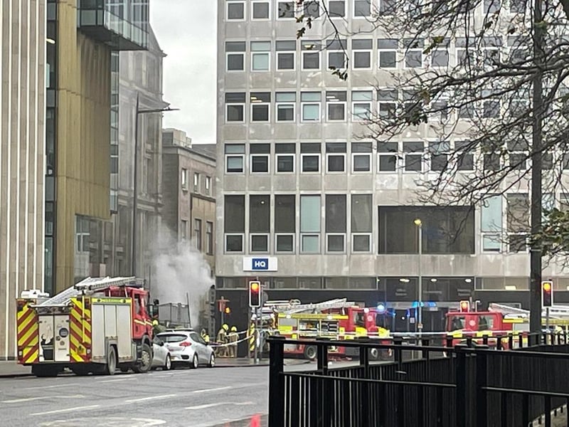 An image shows a plume of smoke coming from the blaze
